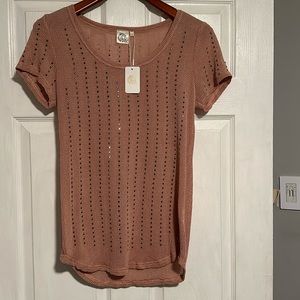 Short sleeve pink top with crystal type studs